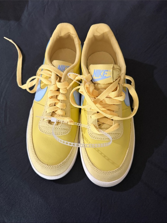 Nike Shoes - Nike Yellow Low Top Sneakers with Light Blue Swoosh
